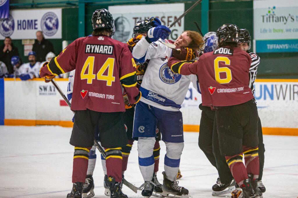Cubs' forward Cameron Shanks guys sucker-punched by a Timmins Rock player