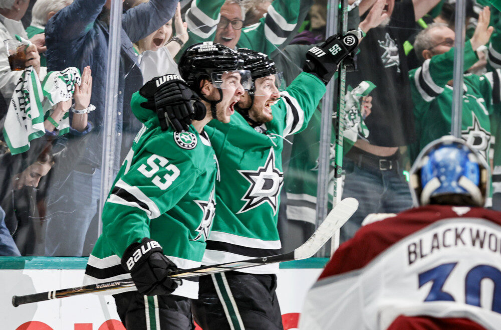 Dallas Stars players celebrate scoring a goal