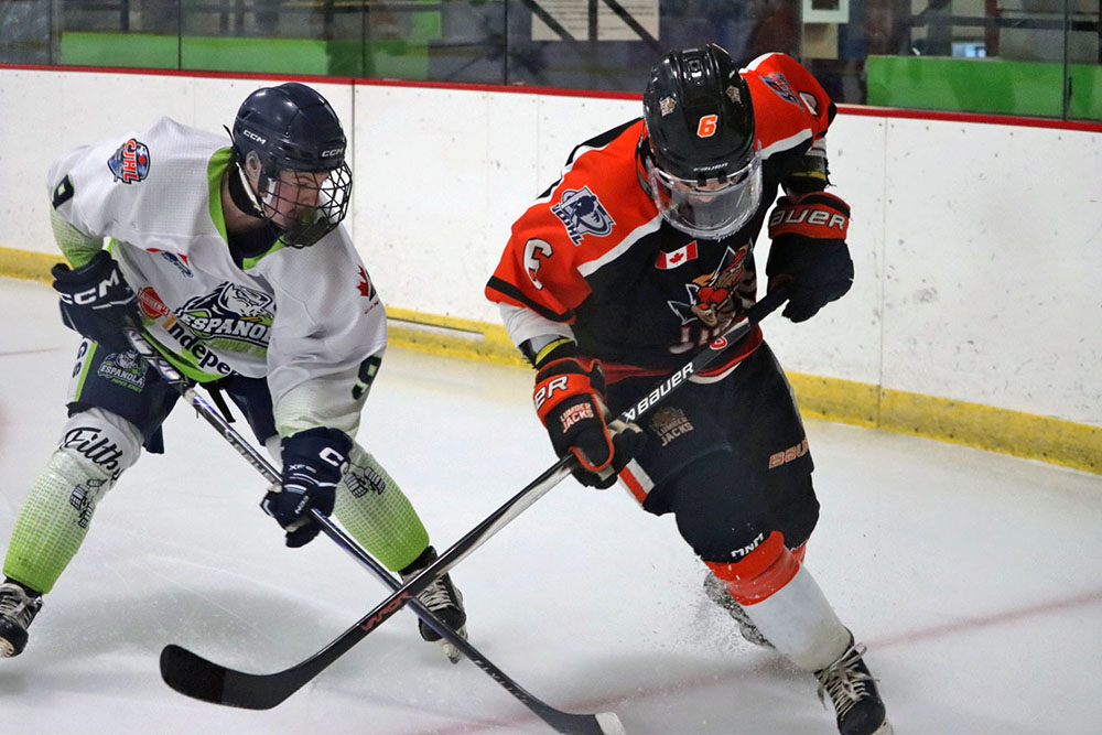NOJHL Weekend Rundown: Sept. 13 31 Two NOJHL players battle for the puck in a game between the Espanola Paper Kings and Hearst Lumberjacks