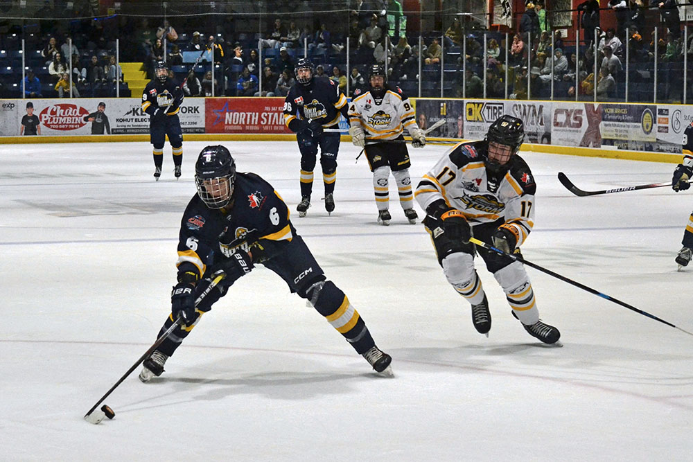 NOJHL and Kirkland Lake Gold Miners' forward Aaron Leenaars (#6) skates into the Soo Eagles offensive zone.